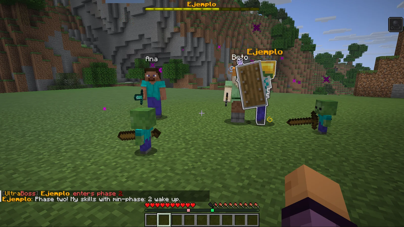 The boss Ejemplo enters phase 2 and announces it in chat, with its minions around